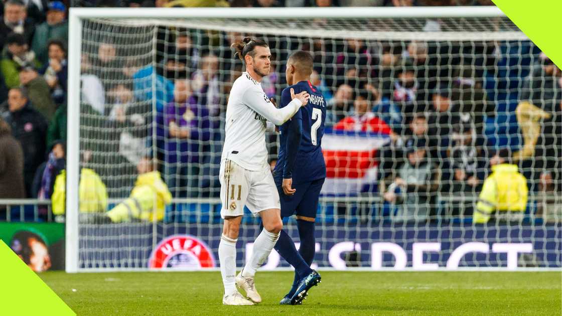 Gareth Bale and Kylian Mbappe share the pitch.