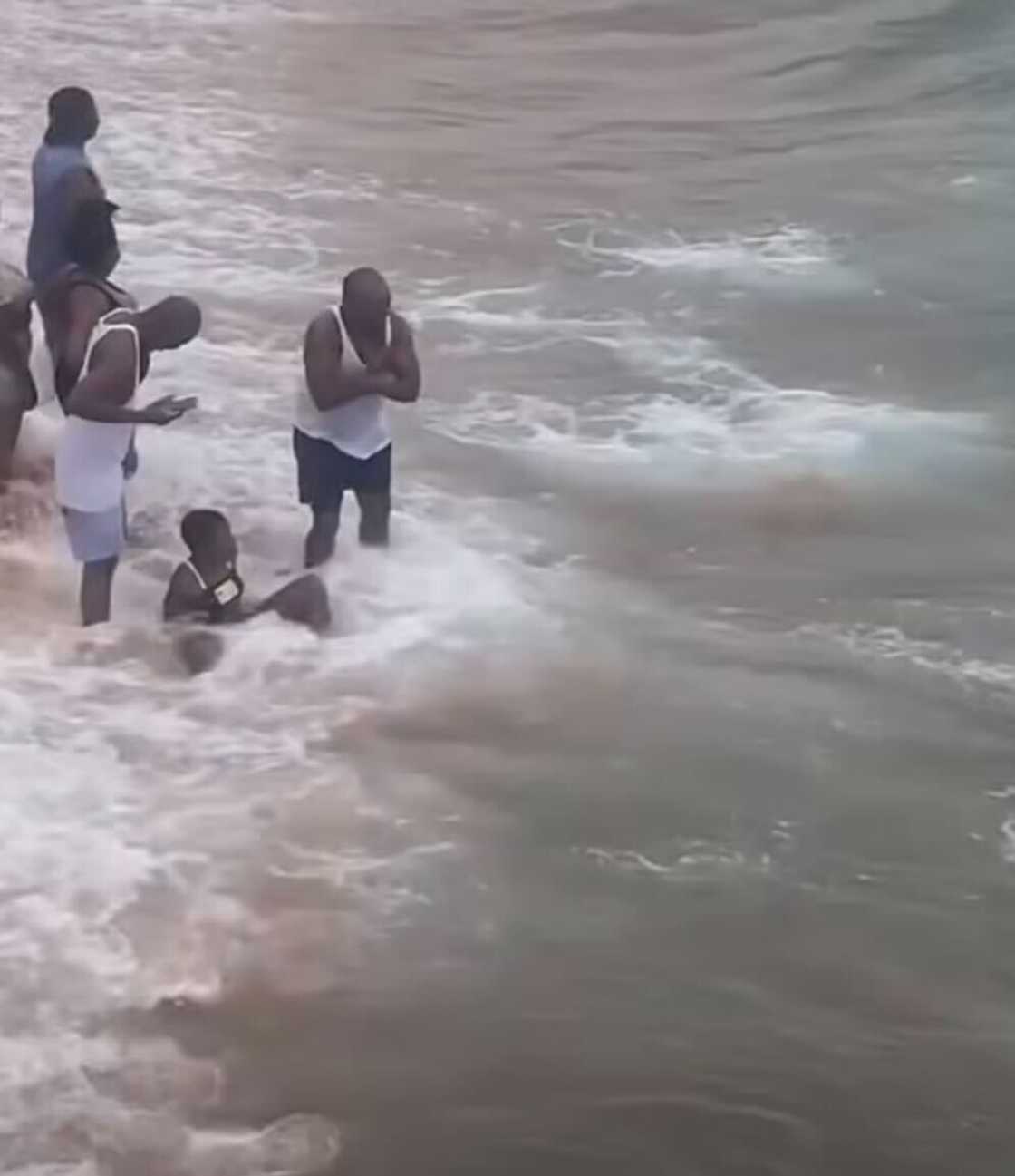 A group of men swam near sharks at Umhlanga Rocks Beach, sparking debate online. A group of men swam near sharks at Umhlanga Rocks Beach, sparking debate online.