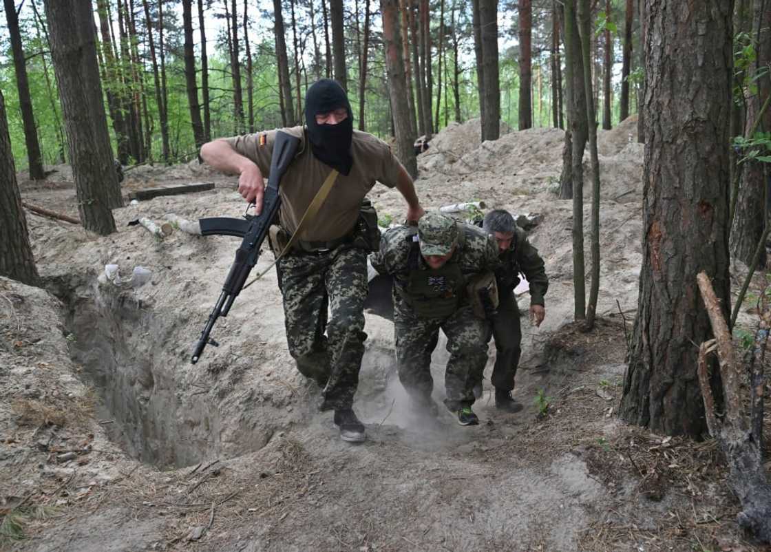 Many of the Ukrainians who have swelled the ranks of the army following the invasion have received training in a forest previously occupied by Russian soldiers Many of the Ukrainians who have swelled the ranks of the army following the invasion have received training in a forest previously occupied by Russian soldiers