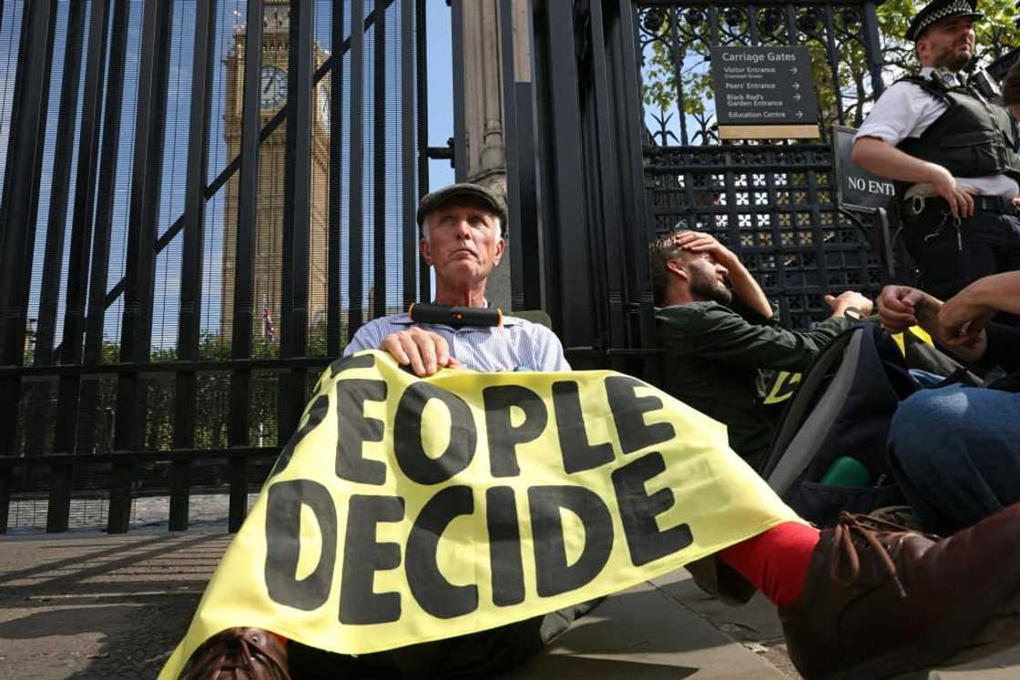 Climate change activists targeted the UK parliament, calling for the public to have more say over environmental policy