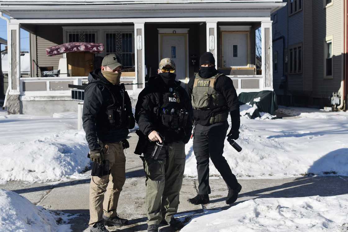 ICE agents patrol a neighbourhood where Renee Good was shot and killed by a federal agent nearby on Portland Avenue, in Minneapolis, Minnesota