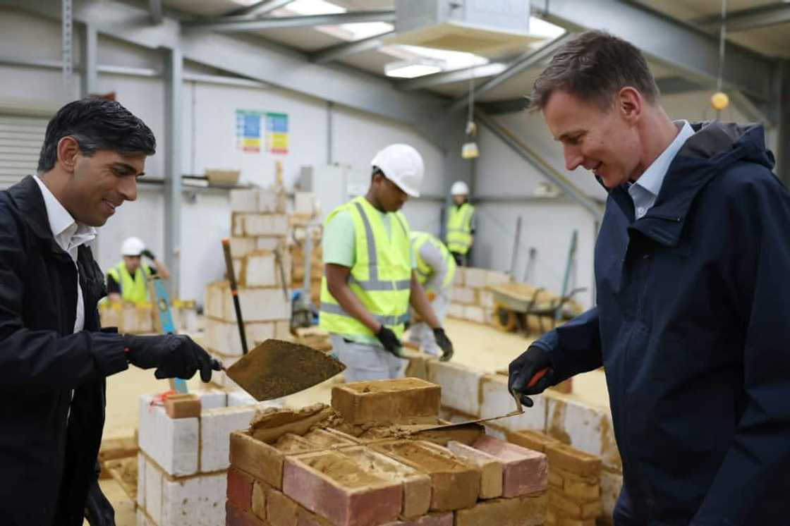 Prime Minister Rishi Sunak (L) and finance minister Jeremy Hunt (R) are looking to rebuild the UK economy Prime Minister Rishi Sunak (L) and finance minister Jeremy Hunt (R) are looking to rebuild the UK economy