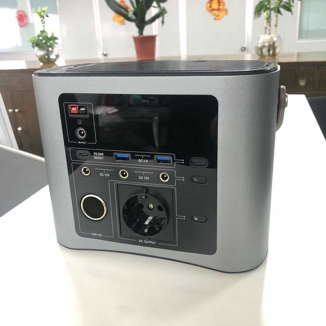 A silver portable power station A silver portable power station