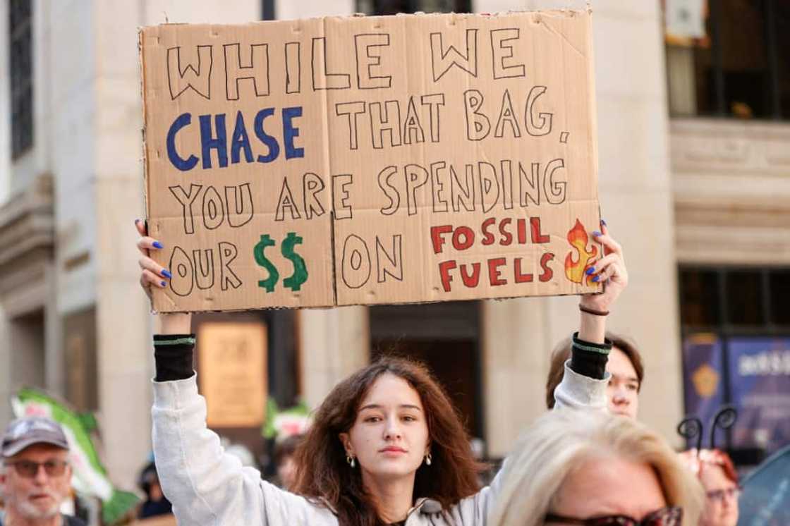 Climate activists protest on September 23, 2022, in Chicago -- such demonstrations are expected to be muted at COP27 in Egypt Climate activists protest on September 23, 2022, in Chicago -- such demonstrations are expected to be muted at COP27 in Egypt