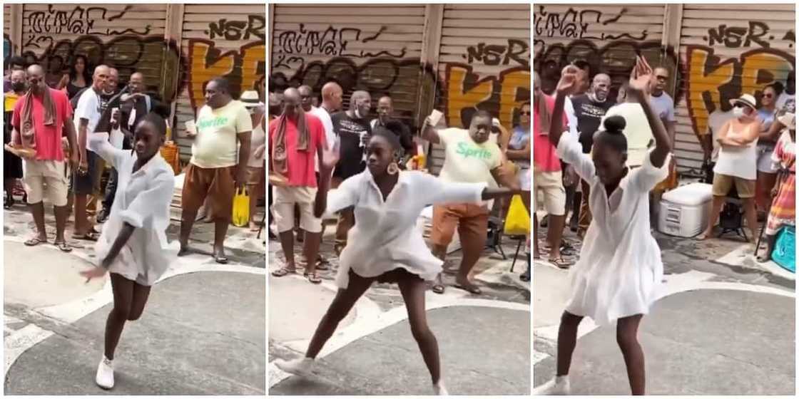 Lady in dress serves sterling dance moves with her legs apart, causes people to fight over her in cute video Lady in dress serves sterling dance moves with her legs apart, causes people to fight over her in cute video