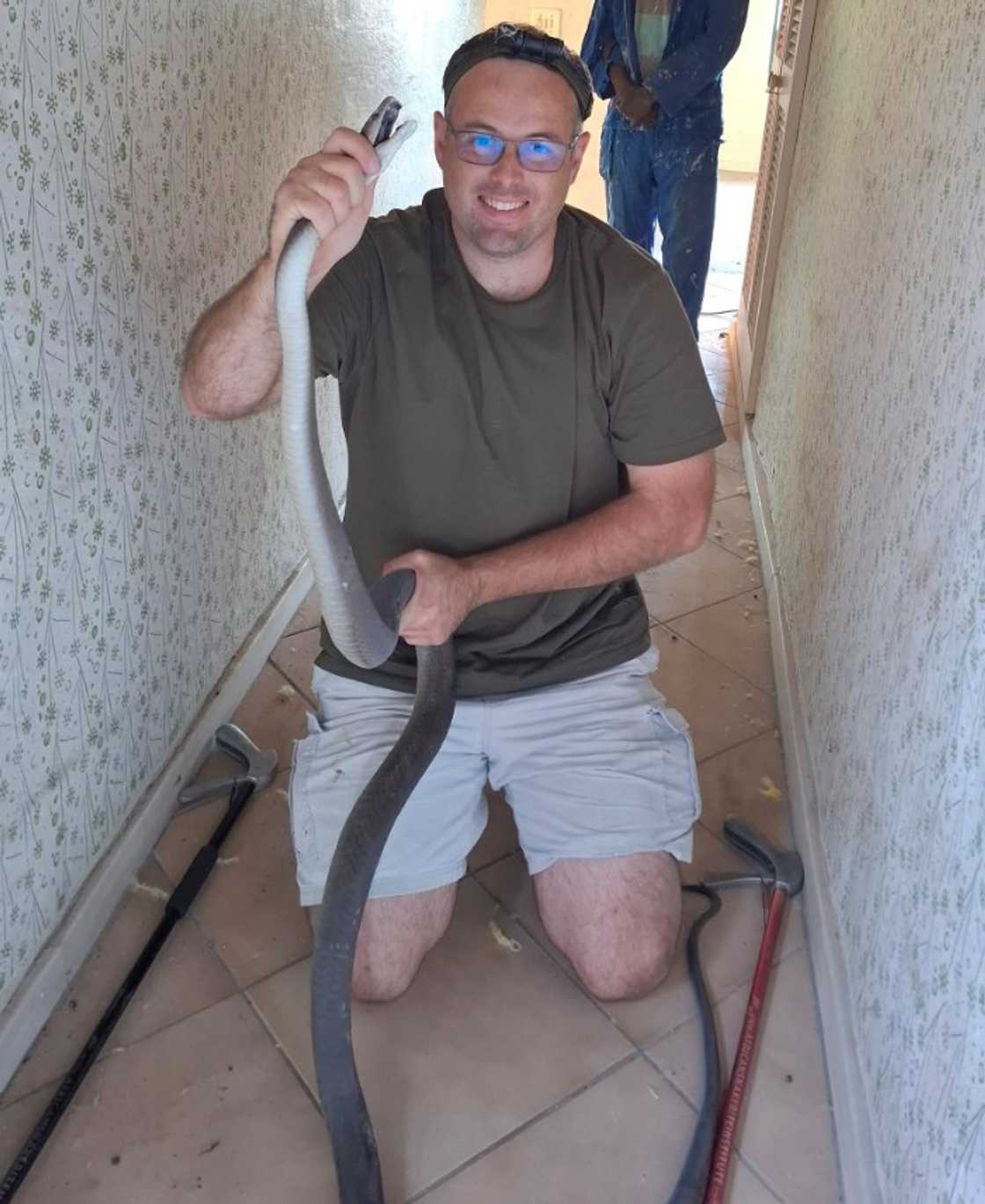 Nick Evans with large black mamba Nick Evans with large black mamba