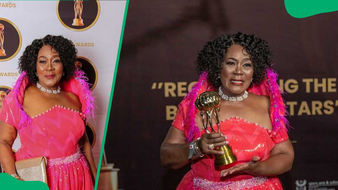 Connie Chiume accepts an award during a ceremony