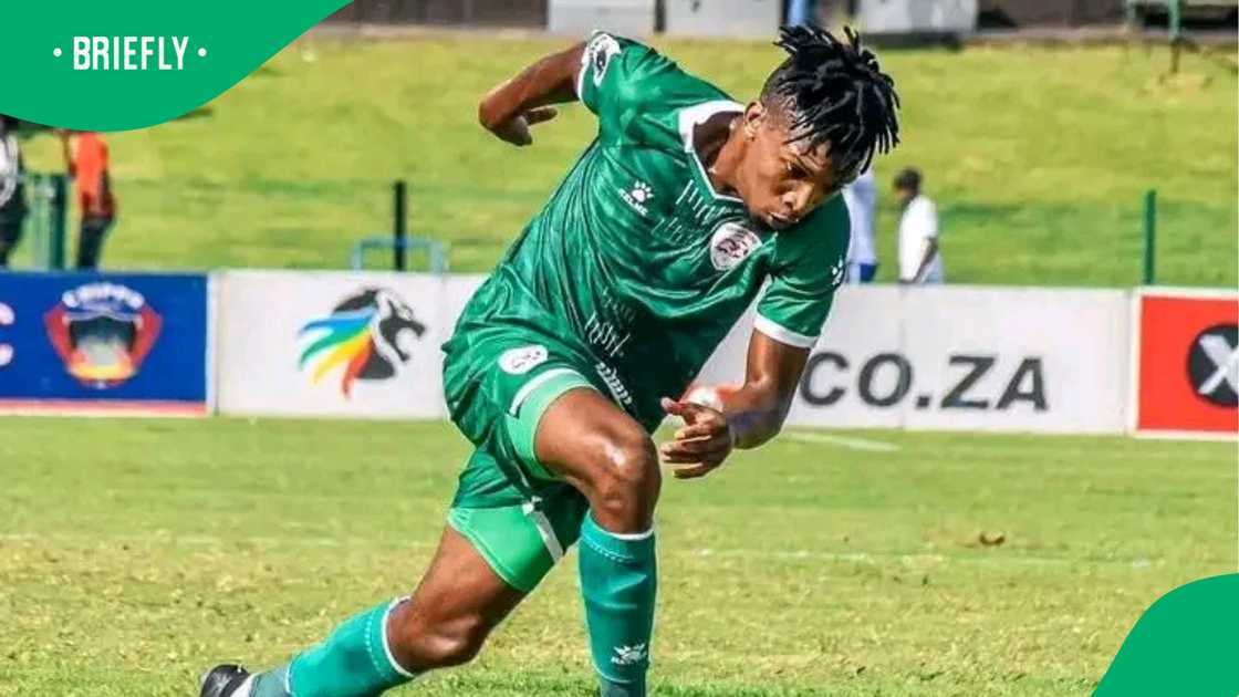 "Sekhukhune United player Shaun Mogaila in action during a match, showcasing his skill on the field.