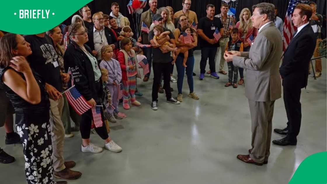 The image captured white refugees who fled South Africa to the US after claiming white genocide The image captured white refugees who fled South Africa to the US after claiming white genocide