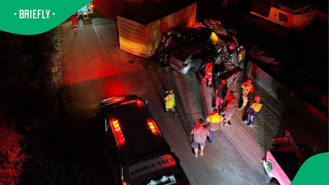 The scene where two vehicles crashed into a container