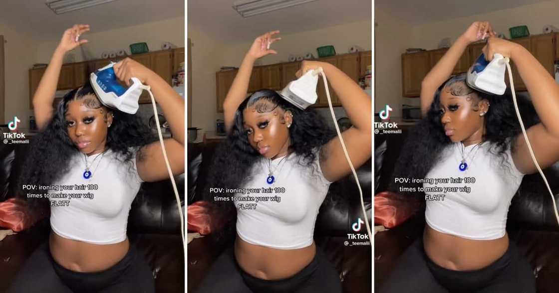 A woman straightened her wig with a clothing iron A woman straightened her wig with a clothing iron