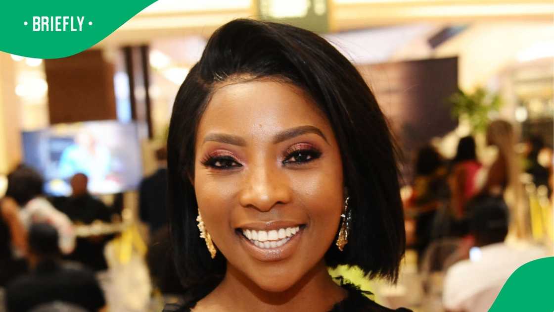 Pearl Modiadie elebrates her son.