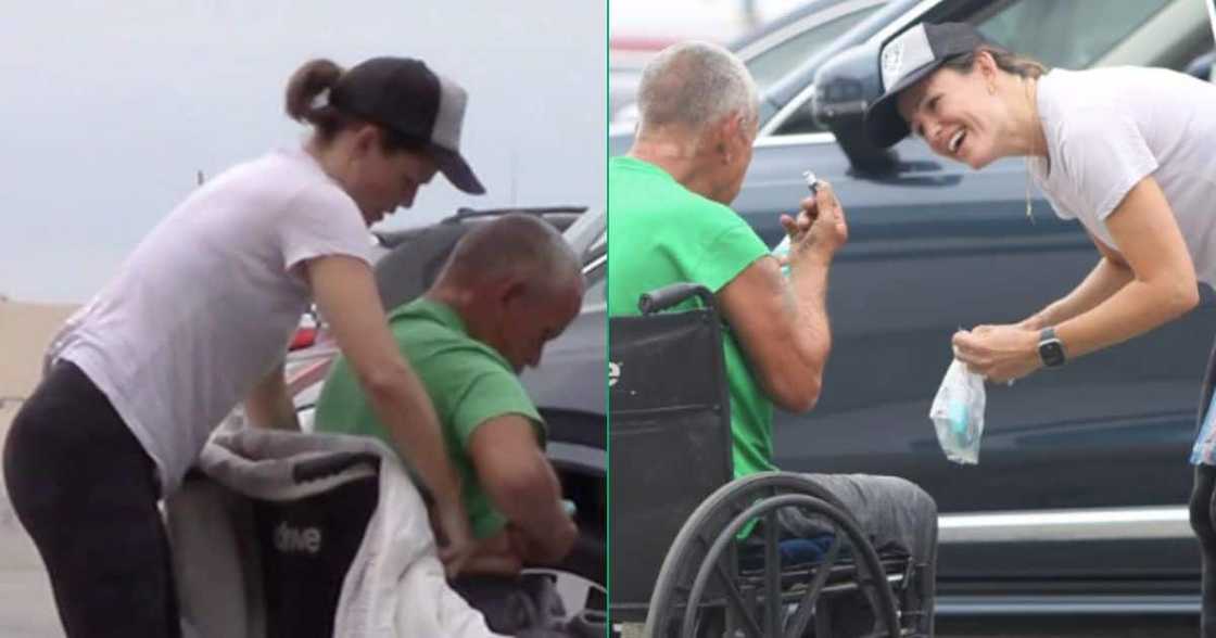 Jennifer Garner helps a homeless man in a wheelchair