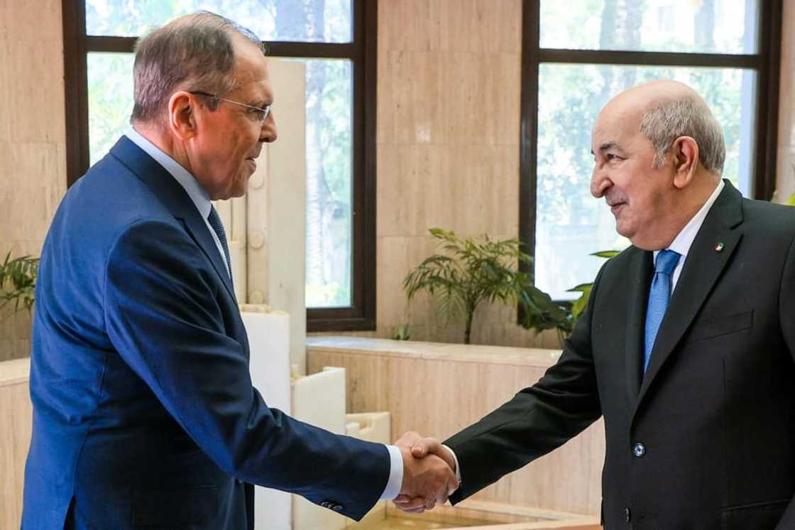 Russian Foreign Minister Sergei Lavrov (L) met Algeria's President Abdelmadjid Tebboune in Algiers on May 10, 2022 Russian Foreign Minister Sergei Lavrov (L) met Algeria's President Abdelmadjid Tebboune in Algiers on May 10, 2022