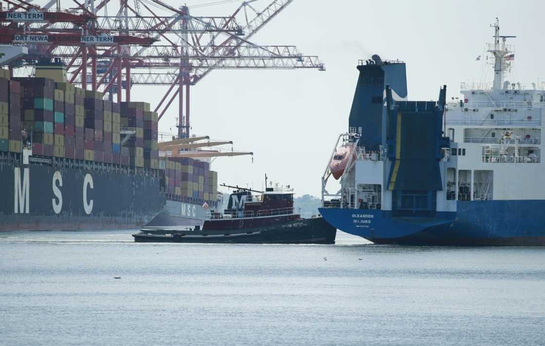 A ship departs from the Port Newark container terminal in Newark, New Jersey on July 21, 2022 A ship departs from the Port Newark container terminal in Newark, New Jersey on July 21, 2022