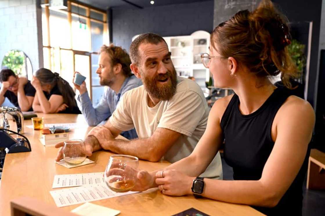 Proud Mary owner Nolan Hirte (2nd R) said the coffee made from Black Jaguar beans gave him 'an out-of-body, enlightened kind of tingle'