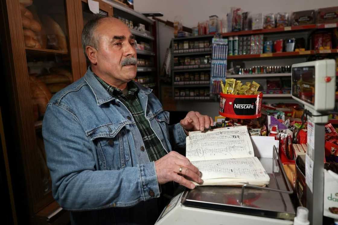 Grocers are using ledgers to write down debts owed by locals during Turkey's economic crisis Grocers are using ledgers to write down debts owed by locals during Turkey's economic crisis