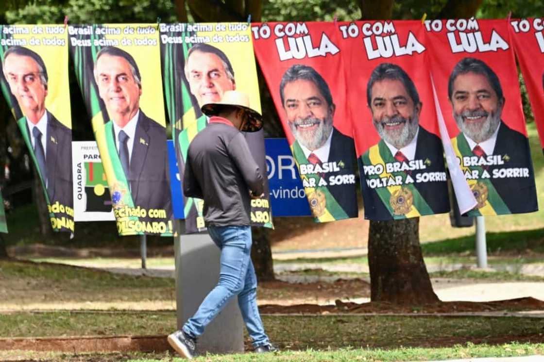 Ex-president Luiz Inacio Lula da Silva (R) and far-right incumbent Jair Bolsonaro are vying for Brazil's presidency Ex-president Luiz Inacio Lula da Silva (R) and far-right incumbent Jair Bolsonaro are vying for Brazil's presidency