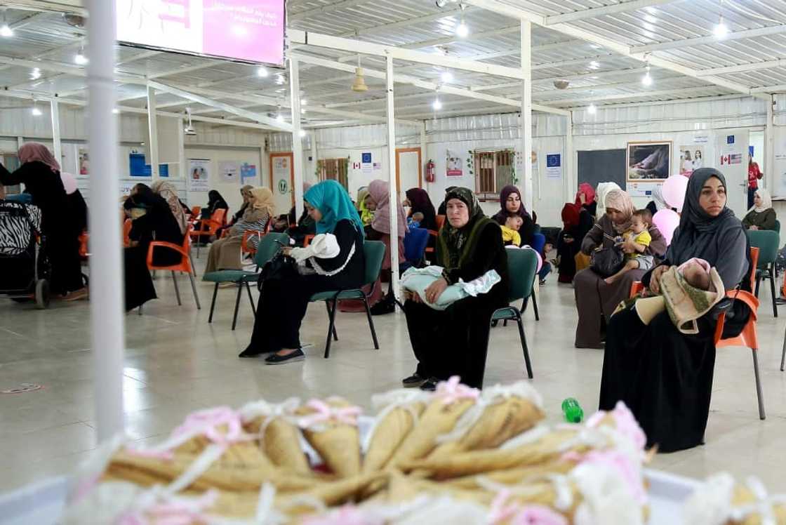 Syrian women wait for a consultation at a clinic in the Zaatari camp: the maternity ward  -- the camp's biggest health facility with 60 staff -- has 10 beds Syrian women wait for a consultation at a clinic in the Zaatari camp: the maternity ward  -- the camp's biggest health facility with 60 staff -- has 10 beds