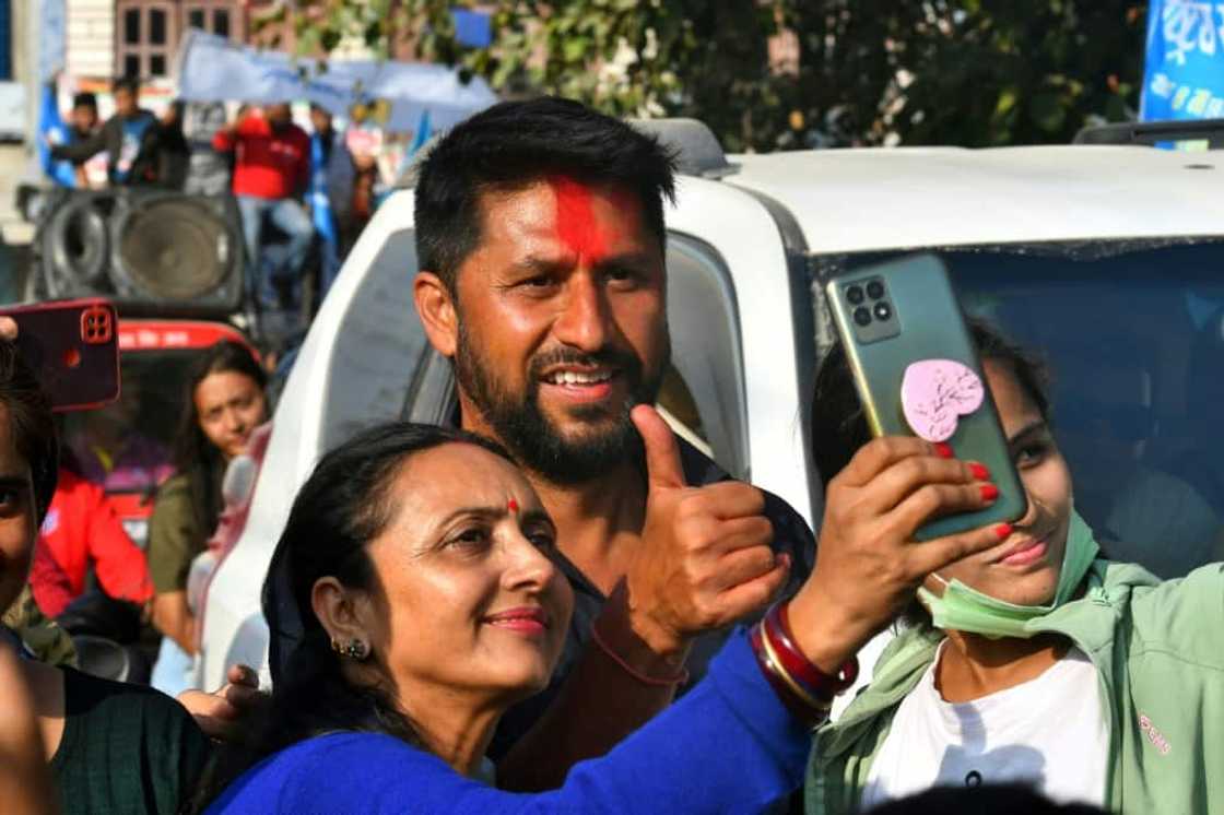Rabi Lamichhane (C) is one of several young upstart candidates who will contest Nepal's general election Rabi Lamichhane (C) is one of several young upstart candidates who will contest Nepal's general election
