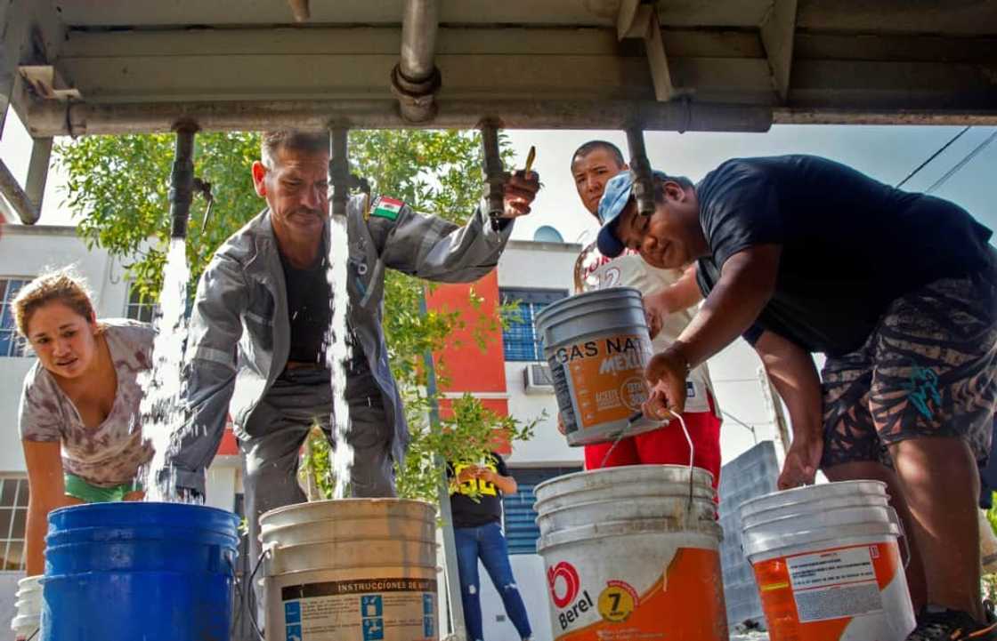 Residents fetch drinking water from a tanker truck in Mexico's drought-hit northern city of Monterrey Residents fetch drinking water from a tanker truck in Mexico's drought-hit northern city of Monterrey