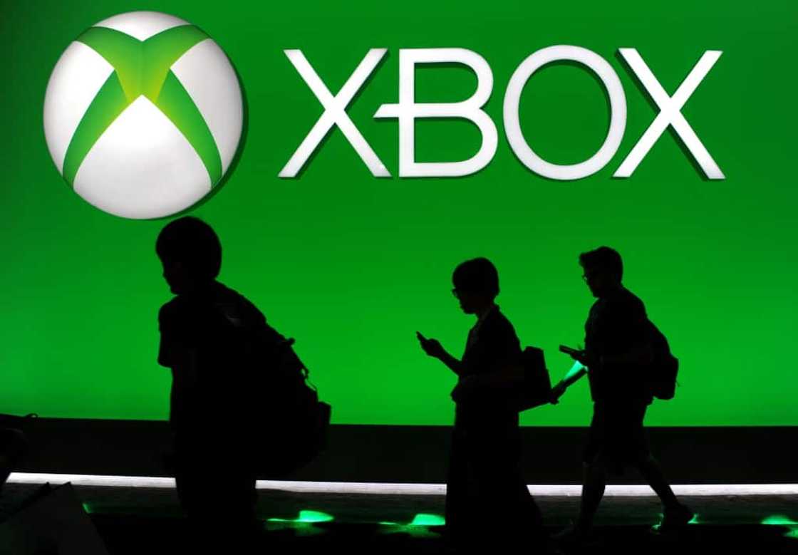 The head of Microsoft's Xbox team says it is not changing its 'fundamental' strategy of exclusive video games but wants to reach as many players as possible with strategic decisions