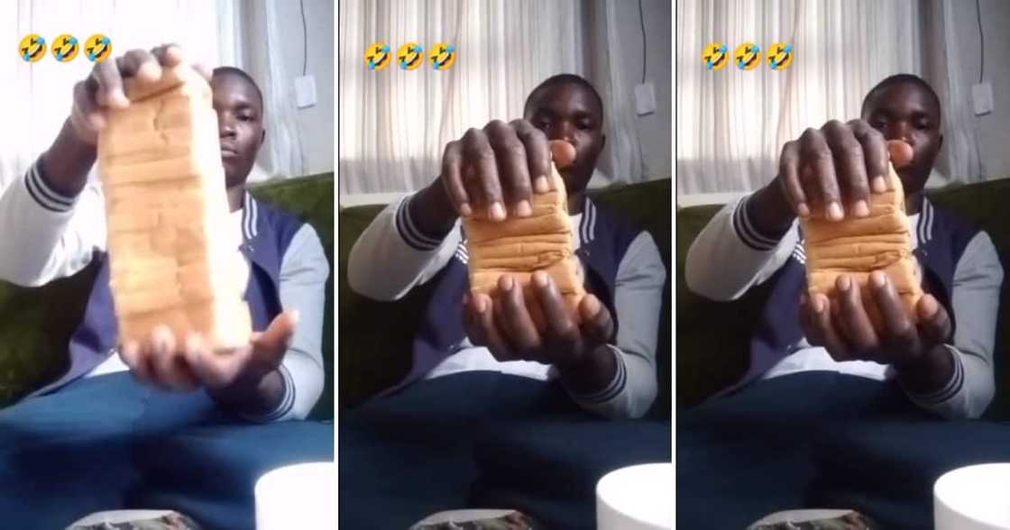 A man crushing an entire loaf of bread A man crushing an entire loaf of bread