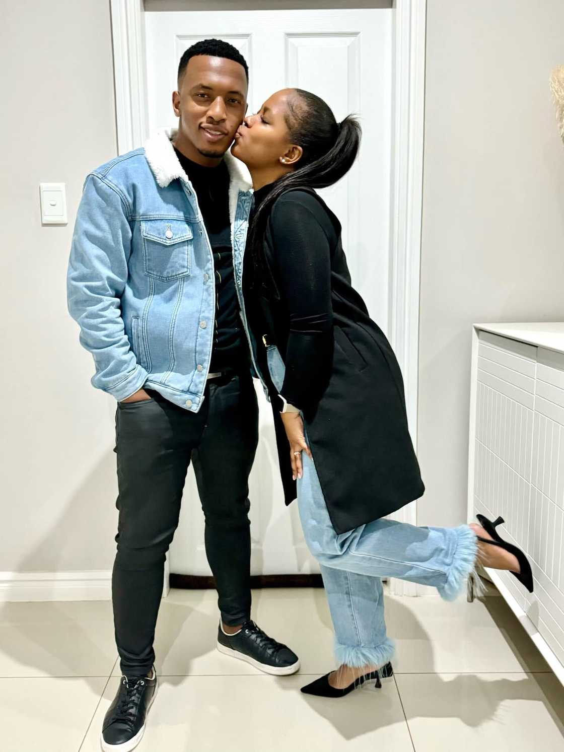 Dumi Mkokstad is protective of his wife
