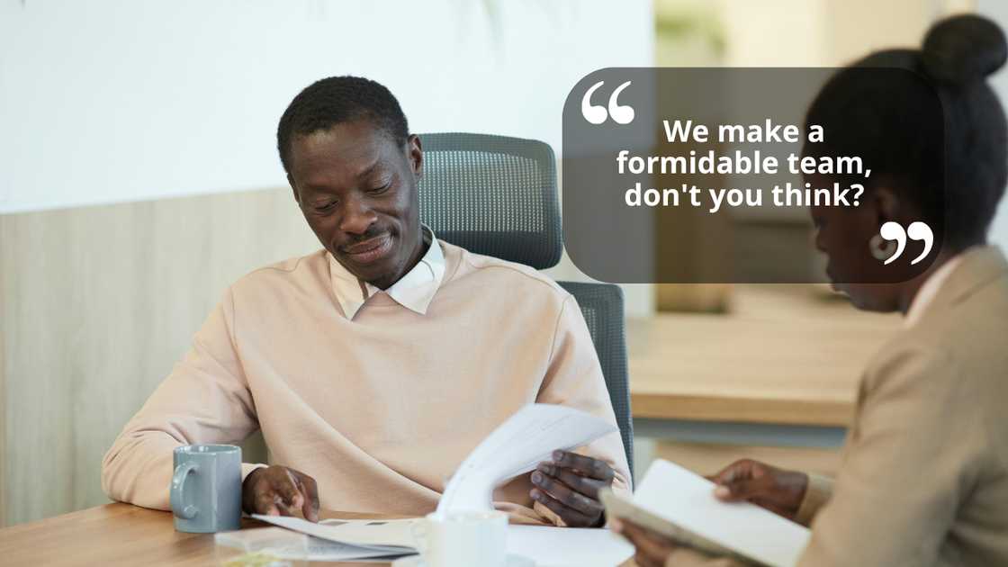 Coworkers talking in an office