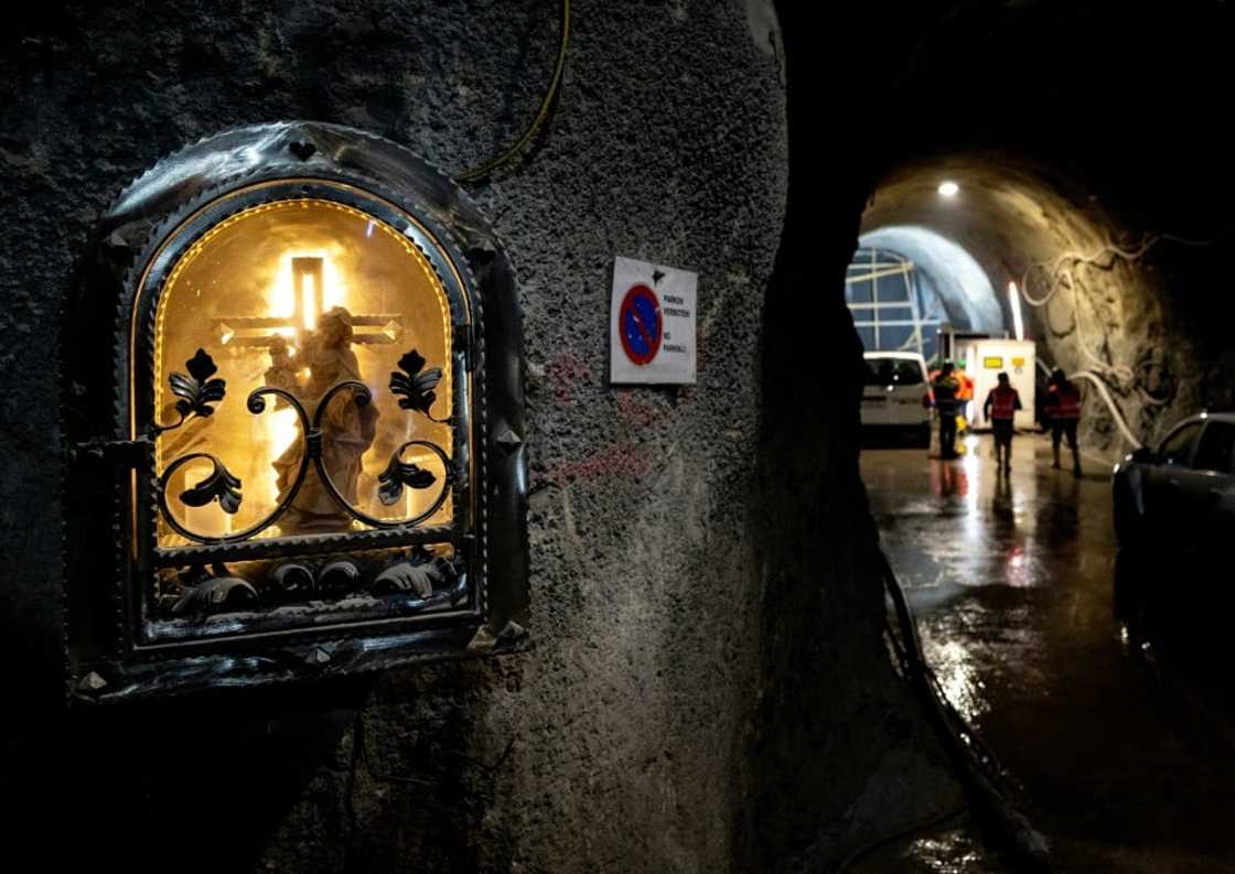 The vast subterranean construction site is dotted with statues of Saint Barbara, patron of miners and others plying dangerous trades The vast subterranean construction site is dotted with statues of Saint Barbara, patron of miners and others plying dangerous trades