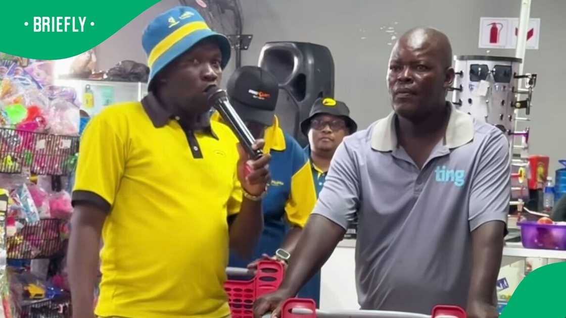 A man took part in a trolley dash, stood at the entrance of the shop before he began.