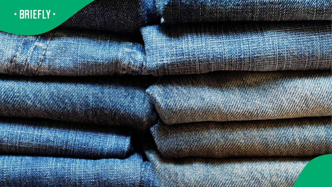 A stock photo of folded denim jeans A stock photo of folded denim jeans