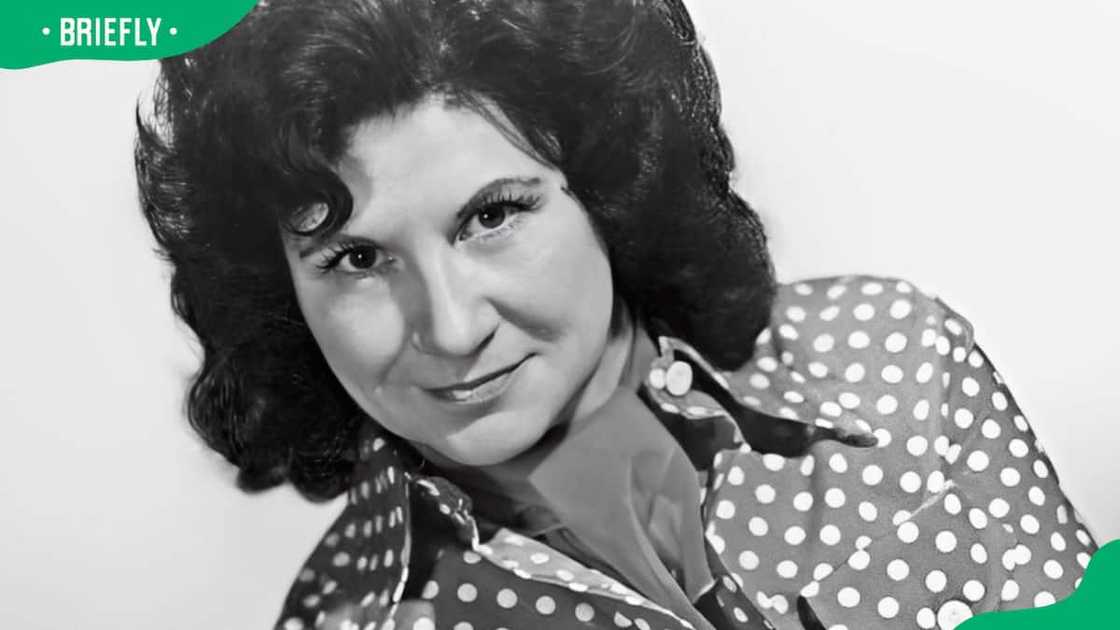 Kitty Wells poses for a portrait Kitty Wells poses for a portrait