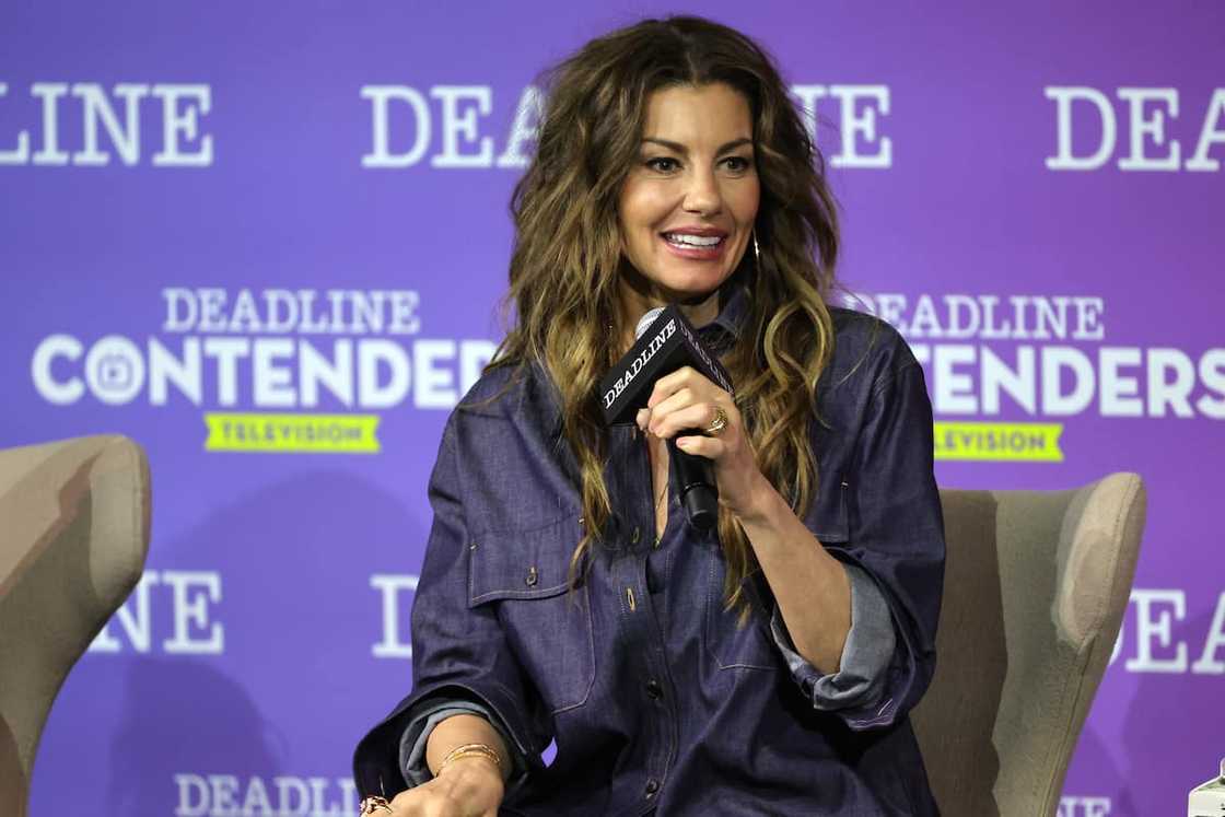 Faith Hill holding a microphone Faith Hill holding a microphone