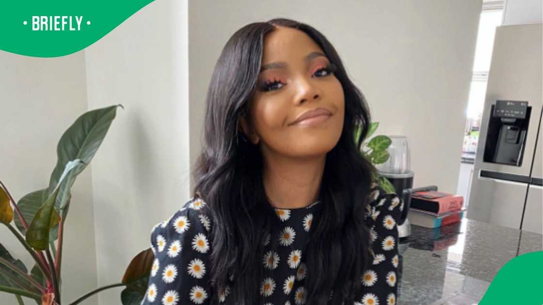 Terry Pheto reacts to Presley Chweneyagae