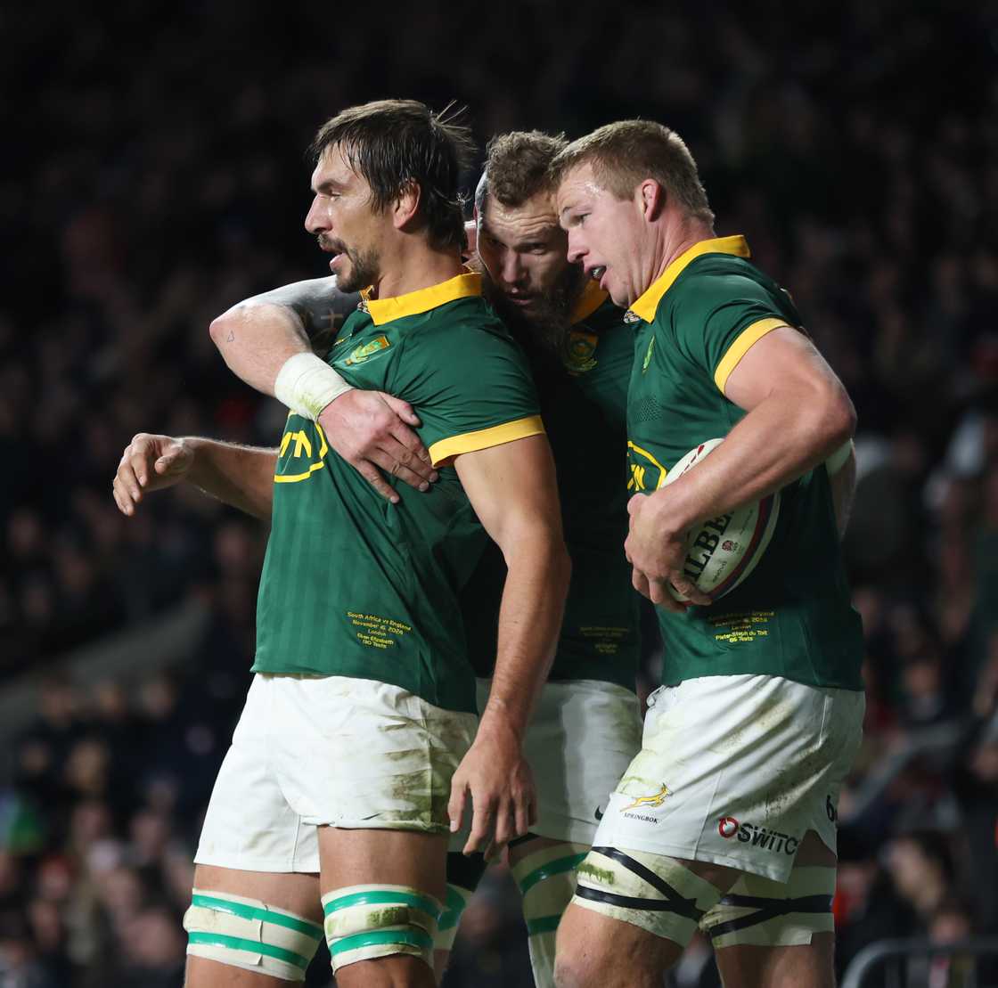 Eben Etzebeth and the Springboks celebrating their 29-20 win against England, showcasing unity and joy after a thrilling Autumn Nations Series match at Twickenham.