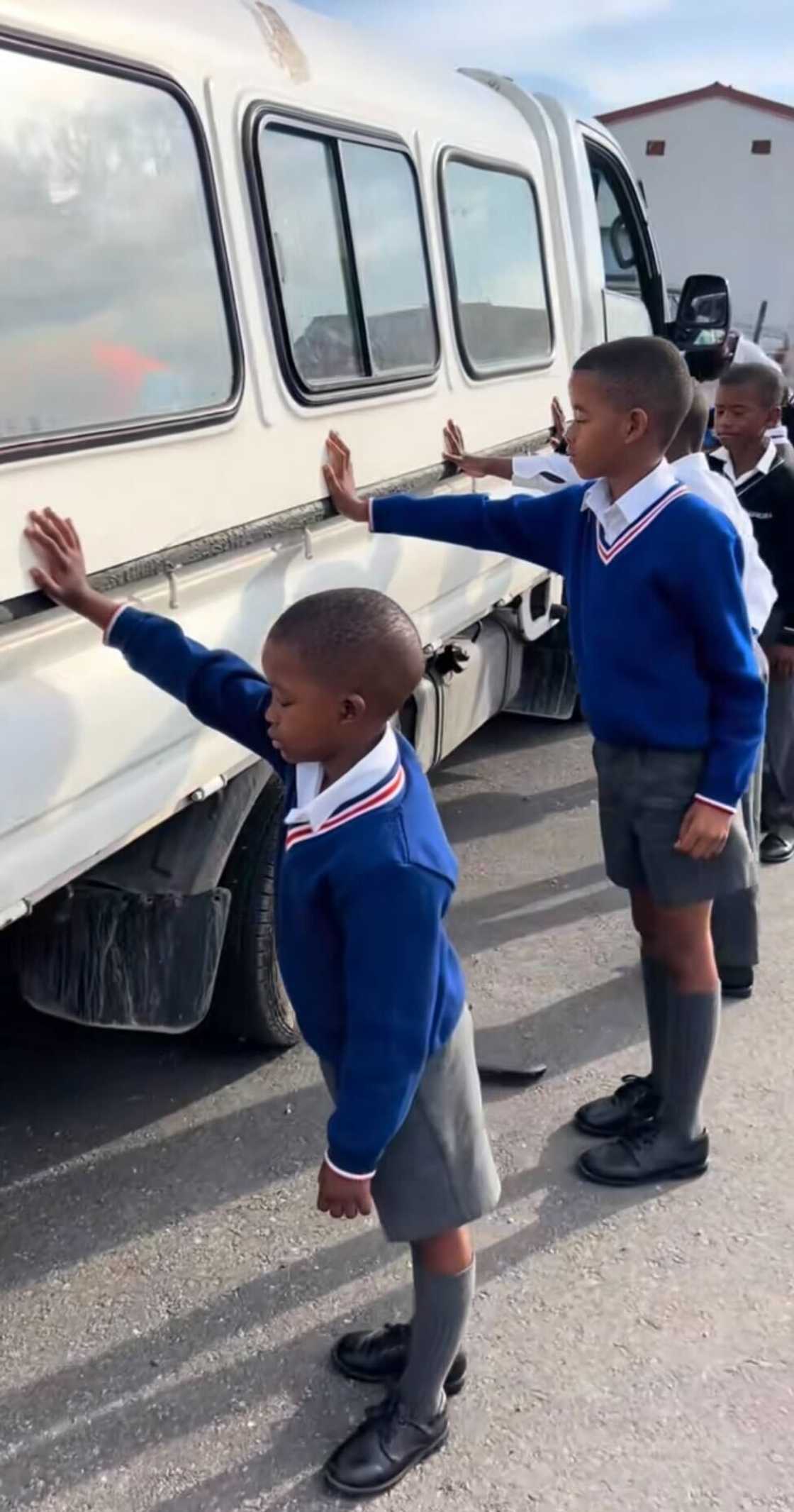 South African kids praying over their transport in a TikTok video.