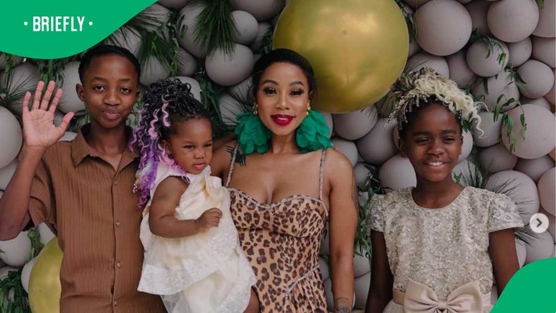 Singer Kelly Khumalo posts photo of her son Christian with a snake Singer Kelly Khumalo posts photo of her son Christian with a snake