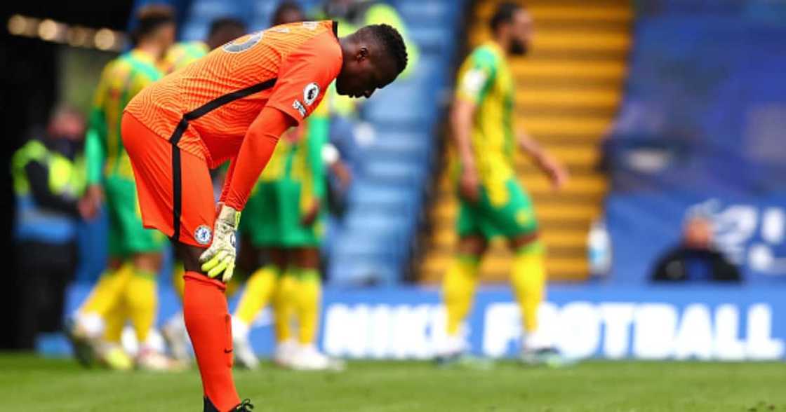 Edouard Mendy of Chelsea looks dejected during the Premier League match between Chelsea and West Bromwich Albion at Stamford Bridge. (Photo by Clive Rose/Getty Images) Edouard Mendy of Chelsea looks dejected during the Premier League match between Chelsea and West Bromwich Albion at Stamford Bridge. (Photo by Clive Rose/Getty Images)