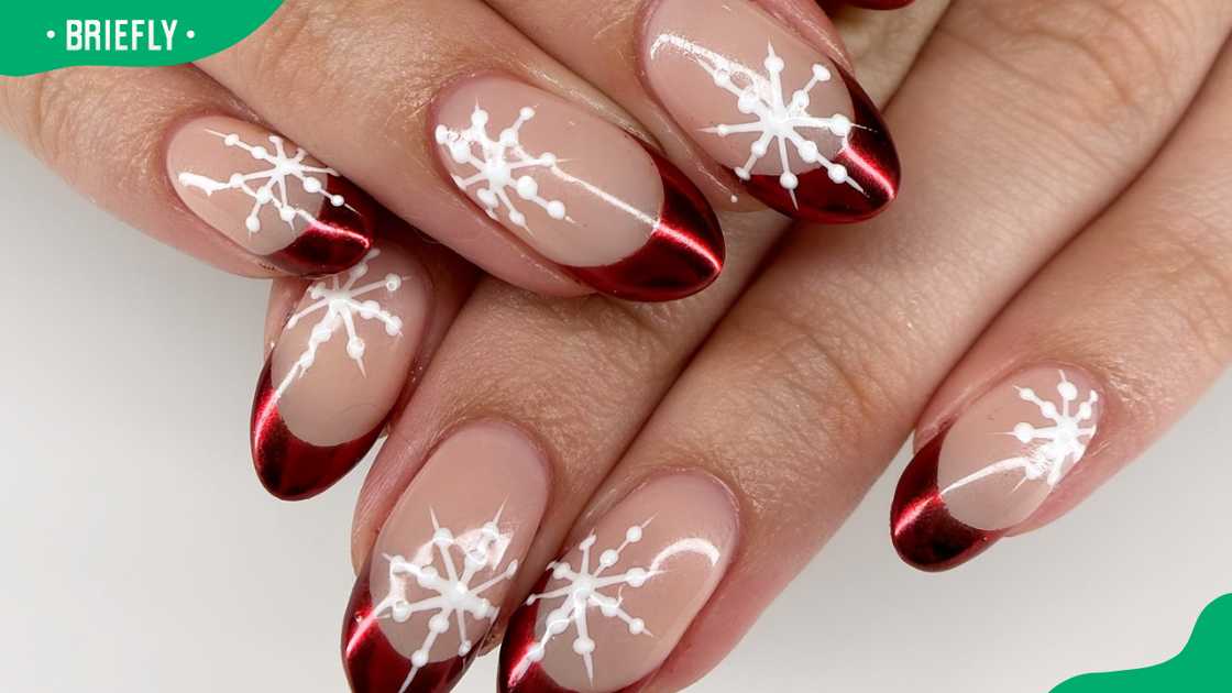 Chrome frenchie with snowflakes nail design