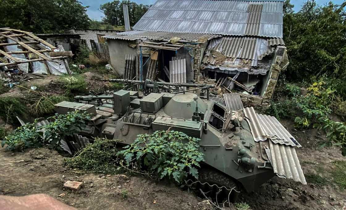 The Russian defence ministry is painting the setback as a strategic 'regrouping' of its troops The Russian defence ministry is painting the setback as a strategic 'regrouping' of its troops