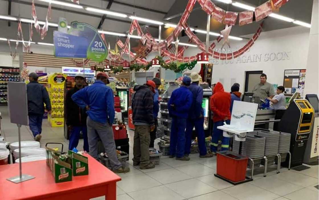 Heart-warming photo shows farmer buying groceries for his workers