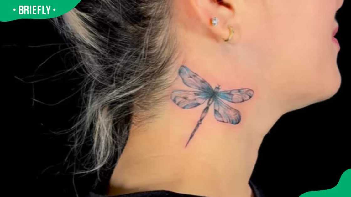 Sideneck dragonfly tattoo Sideneck dragonfly tattoo