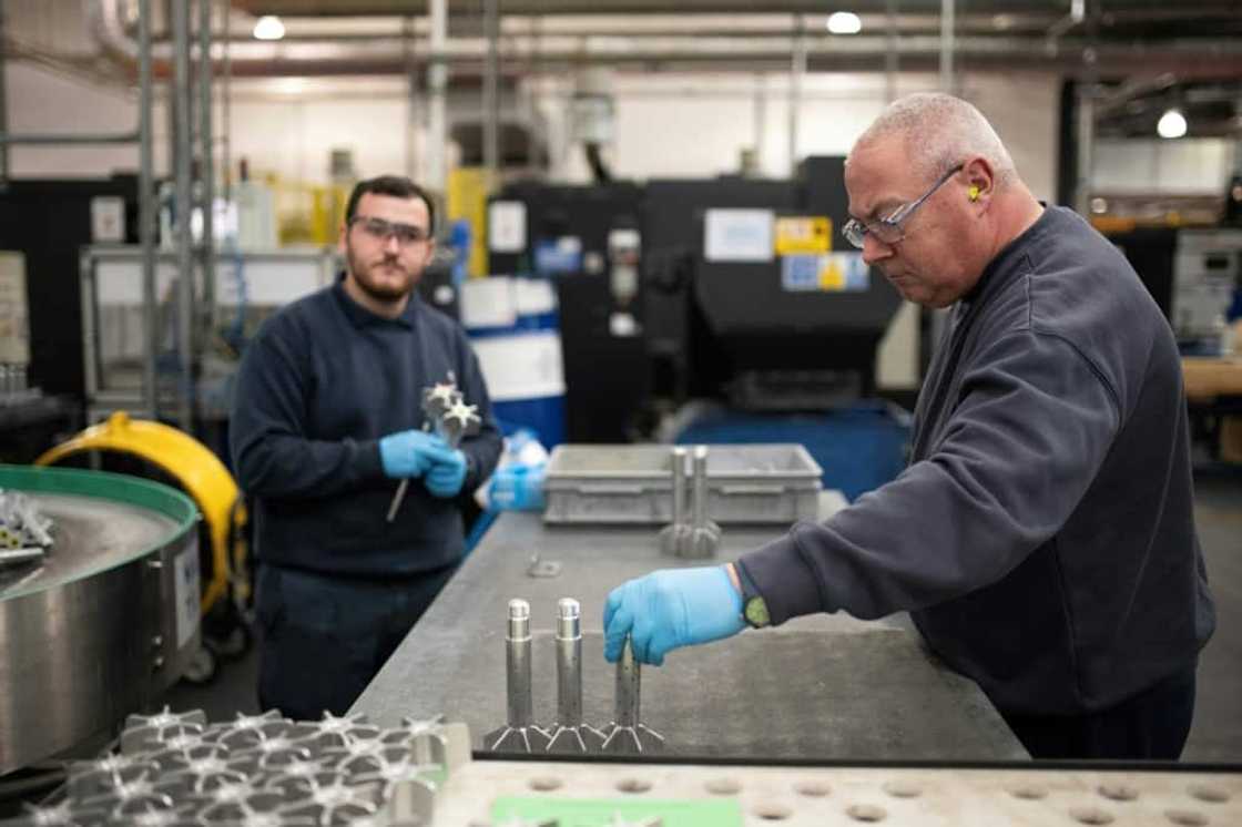 Fourteen machines and 340 workers forge and paint artillery, mortars and tank ammunitions at BAE's Washington site