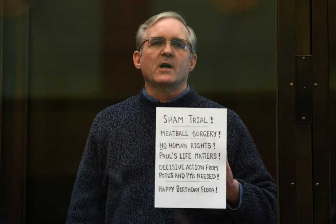 In this file photo taken on June 15, 2020 Paul Whelan, a former US marine accused of espionage, stands inside a defendants' cage as he waits to hear his verdict in Moscow In this file photo taken on June 15, 2020 Paul Whelan, a former US marine accused of espionage, stands inside a defendants' cage as he waits to hear his verdict in Moscow