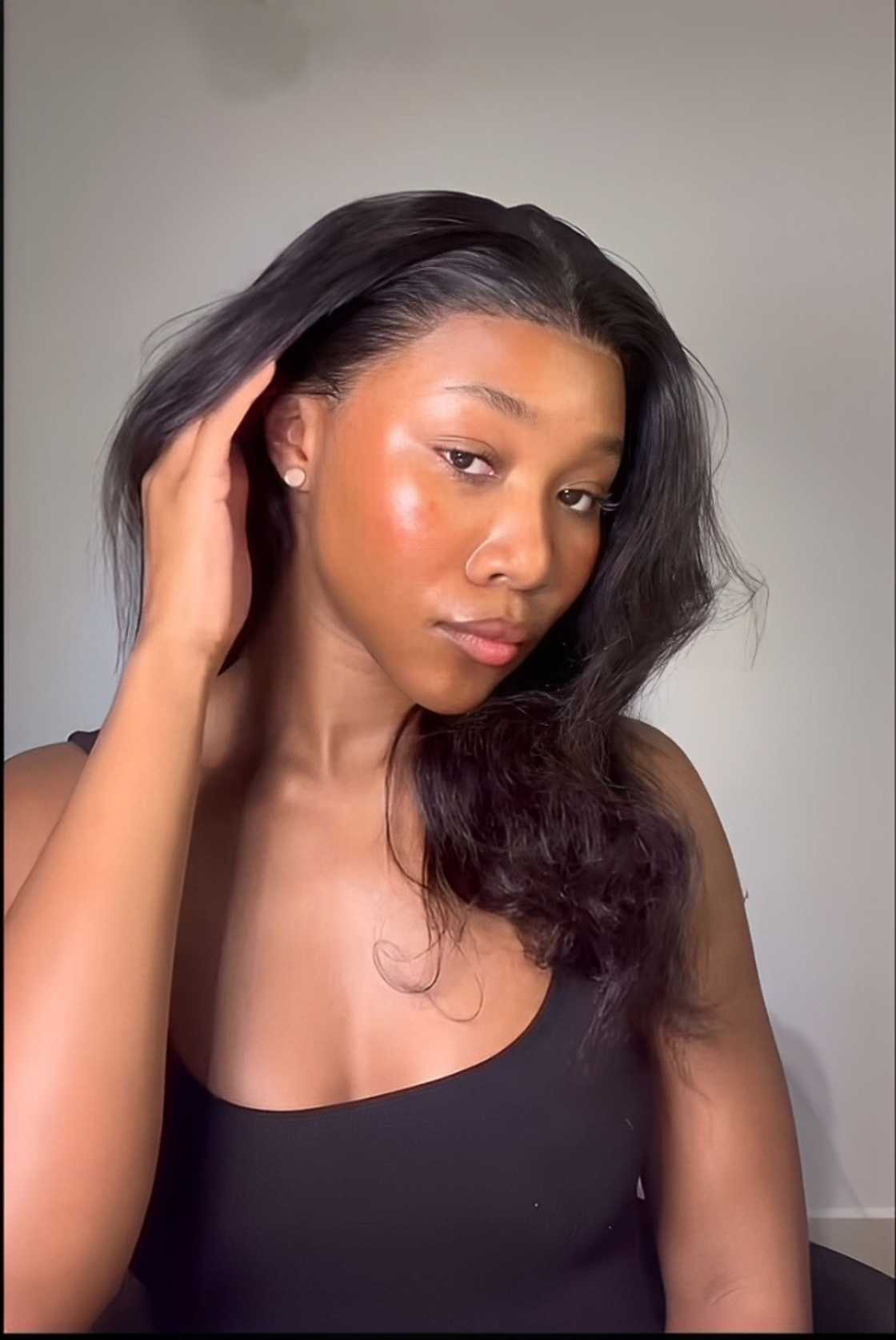 A lady showed off products to get rid of dark inner thighs in a TikTok video. A lady showed off products to get rid of dark inner thighs in a TikTok video.