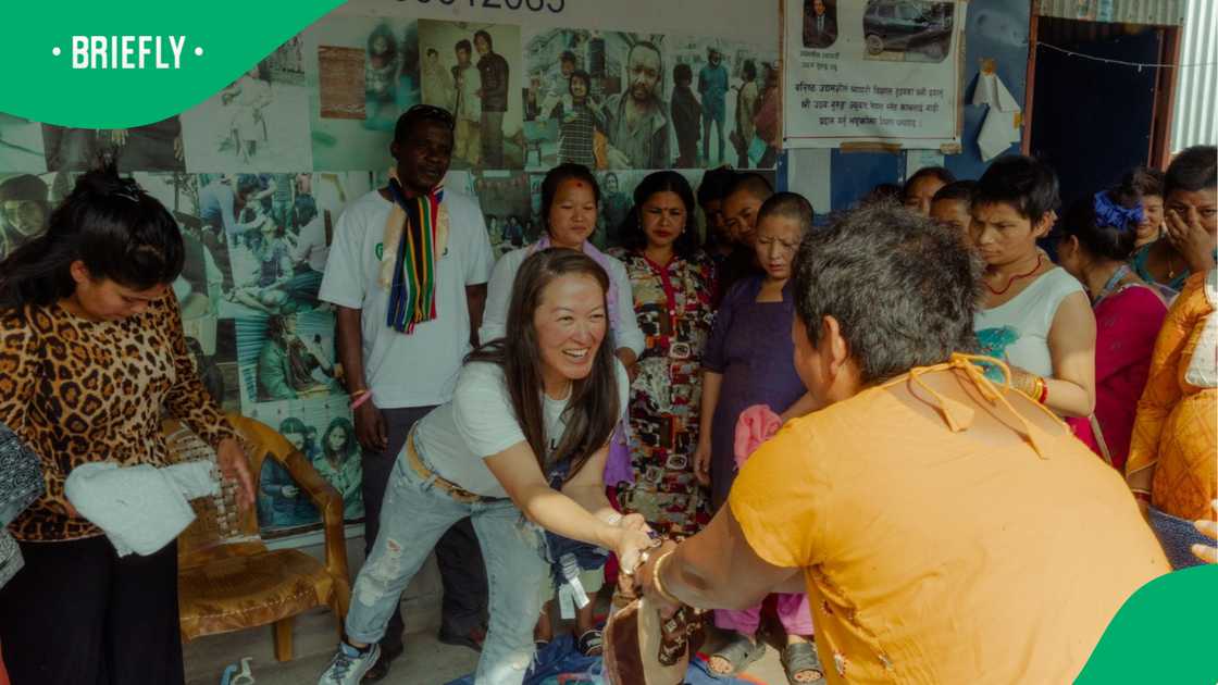 Impilo Collection Foundation founder Angela Yeung gifted Nepalese people with clothing and stationery.