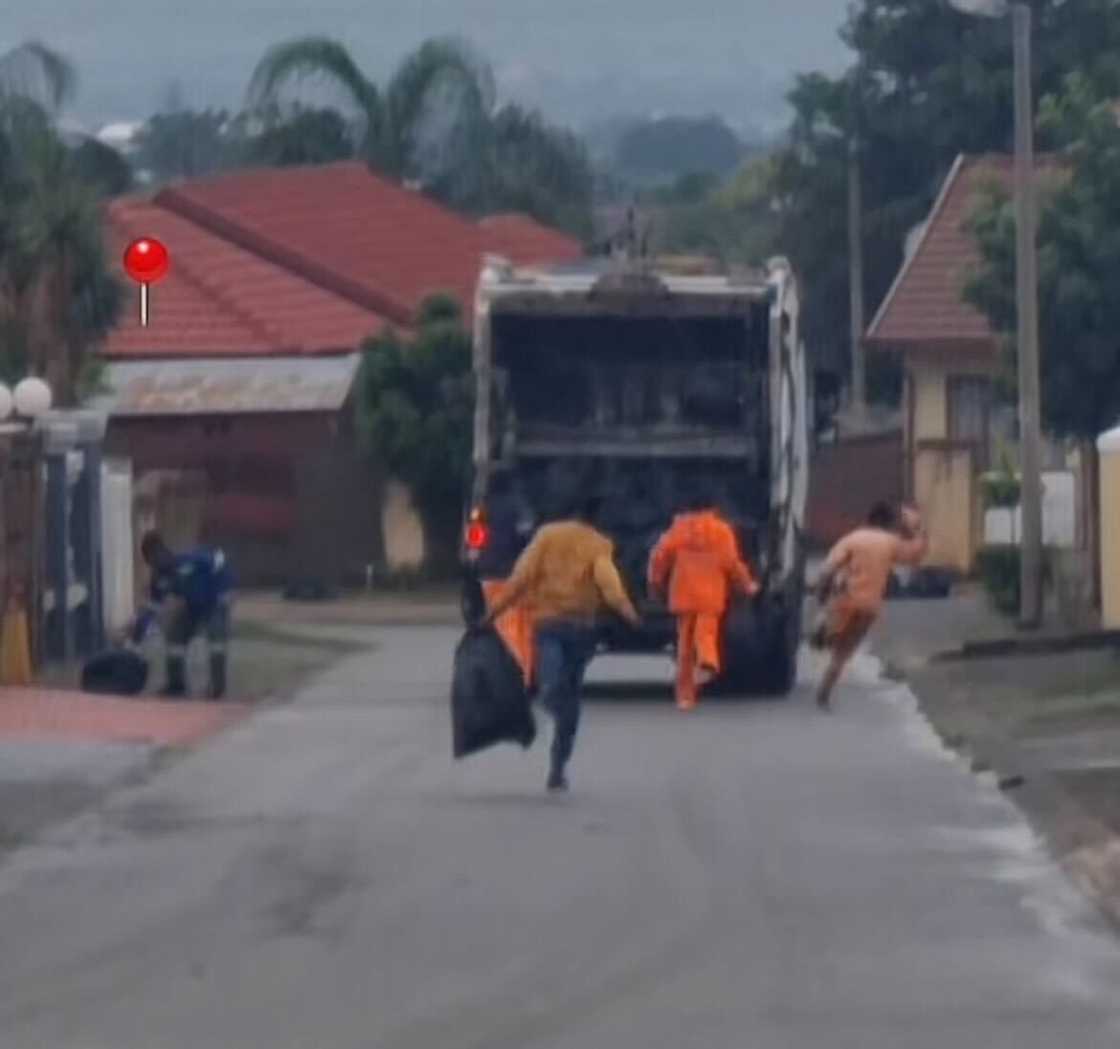A man was captured in a video chasing rubbish collectors. A man was captured in a video chasing rubbish collectors.