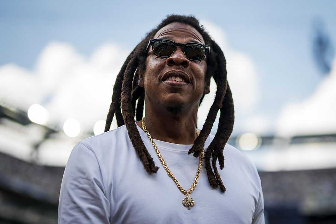 Jay-Z (Shawn Corey Carter) in a white t-shirt at the semi final football match between Paris Saint-Germain FC and Real Madrid CF in 2025
