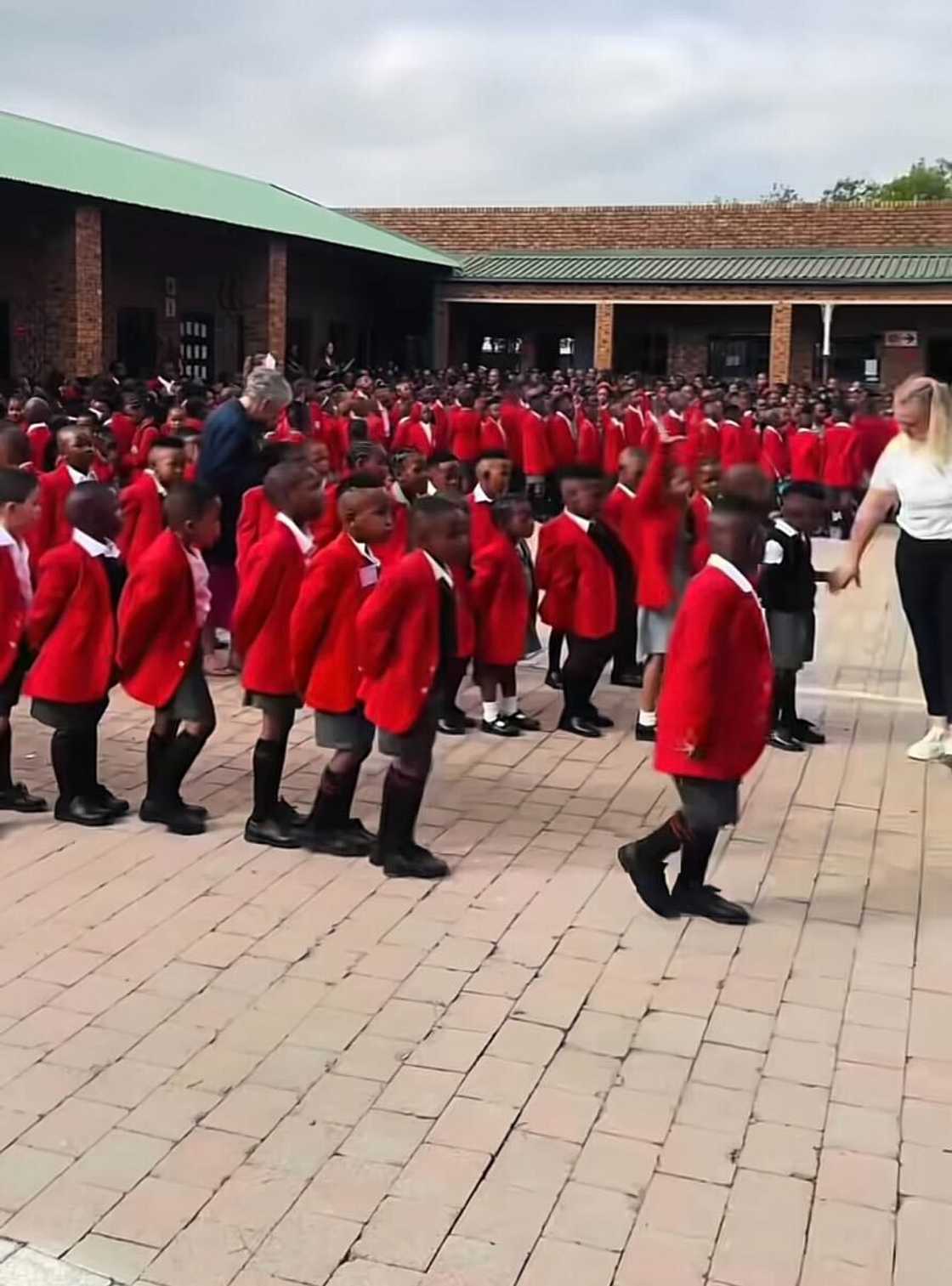 School pupils lined up on the first day of school.